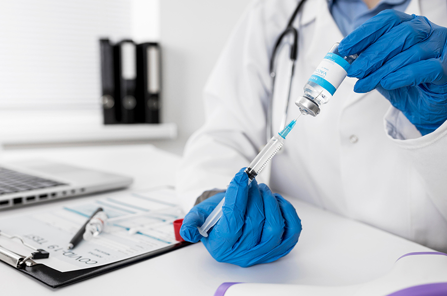 Vaccination administration at Precision Medical Center
